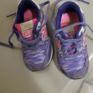 Purple New Balance baby shoes size 5